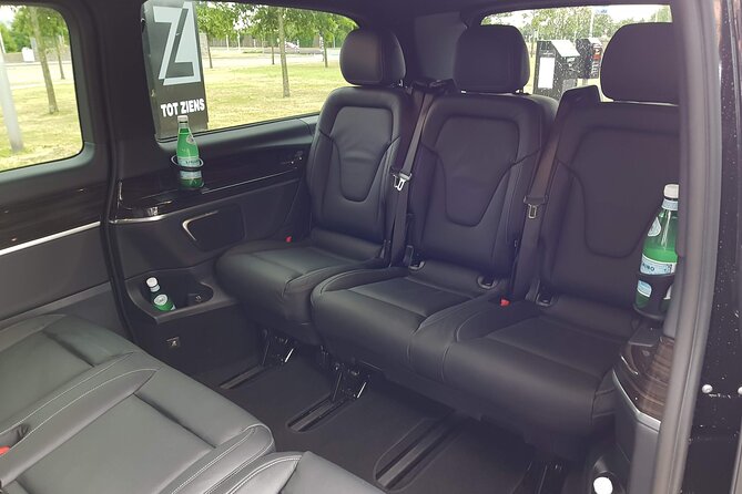Amsterdam to Schiphol Airport Transfer Comfort & service. - Inside the ride: luggage room, legroom, and Wi‑Fi