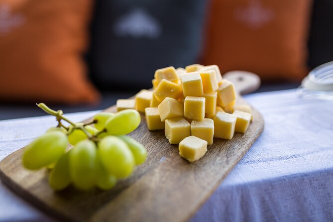 Amsterdam Walking Tour and Cruise with Drinks and Cheese Tasting - Muntplein, Dam Square, and the Begijnhof gardens: classics plus a calmer pause