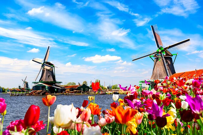 Amsterdam: Windmills, Cheese and Volendam Tour with Video Guide - Starting at AlohaDe Ruijterkade: a clean, guided loop
