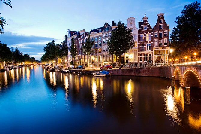 Amsterdam Wine and Cheese Evening Cruise - Inside the glass boat: seating, refills, and how the tasting really lands