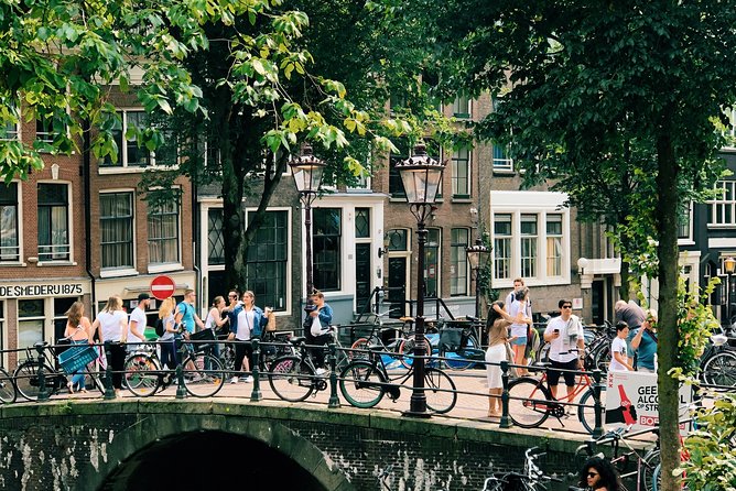 Amsterdam's Unexpected Treasures Private Walking Tour - Canalside atmosphere and St. Nicholas Basilica: history you can feel