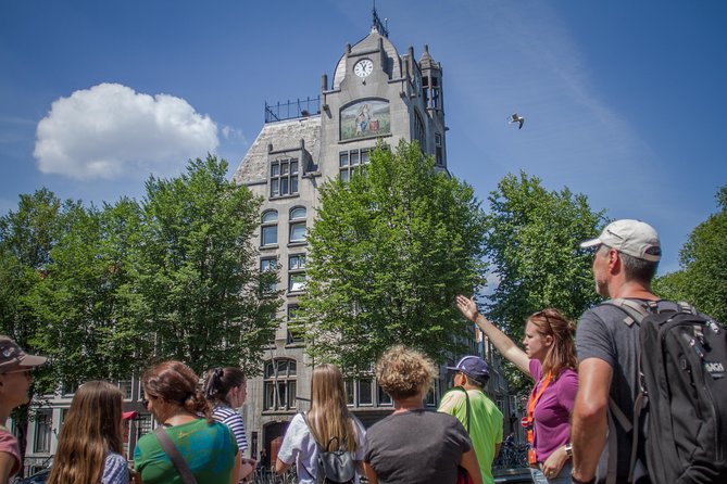 Anne Frank Walking Tour Amsterdam Including Jewish Cultural Quarter - The Anne Frank walking portion near Waterlooplein: connecting people to streets