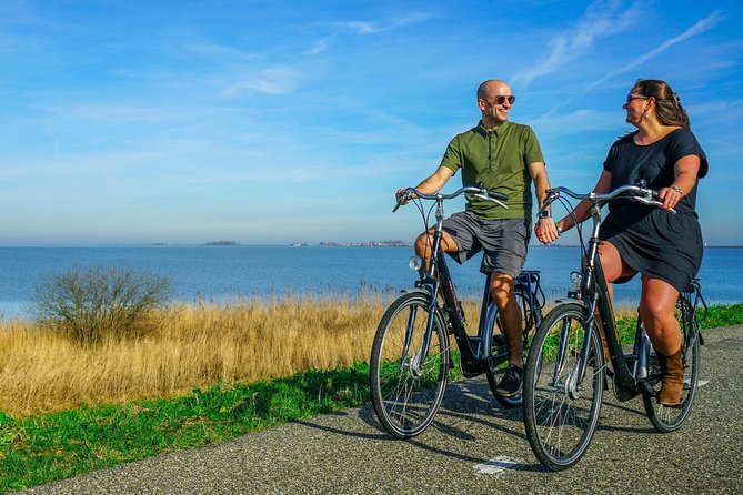 Bike rental Volendam - Explore the Countryside of Amsterdam - Why the Dikes Here Feel Different: Top Views, Below-Sea-Level Riding, and Photos