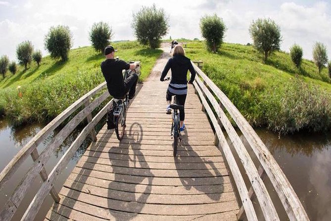 Cheese, Canals & Windmill Countryside E-Bike Tour Amsterdam - The Ferry Start: Amsterdam Centraal to Amsterdam North via the IJ