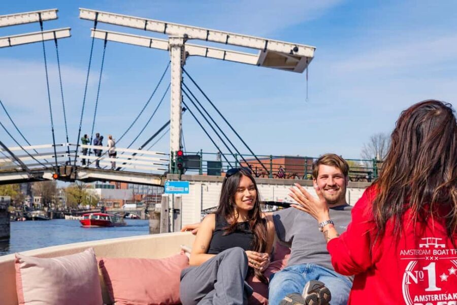 Cheese & Drinks Guided Amsterdam Boat Tour, All Inclusive - The onboard guide: stories that stick (especially on a short ride)