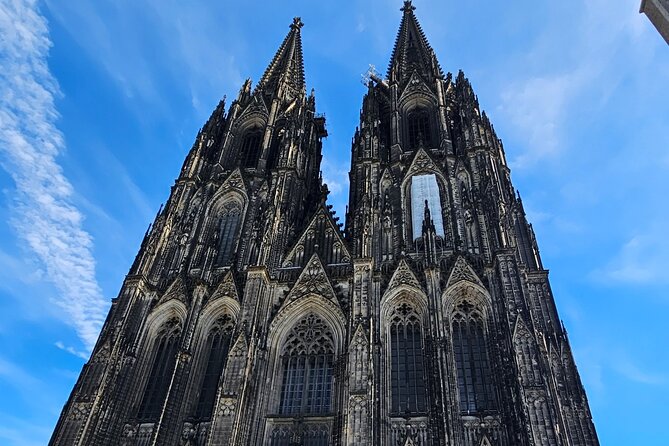 Cologne Small-Group Day Tour from Amsterdam - Neumarkt passage and the Market of Angels lighting moment