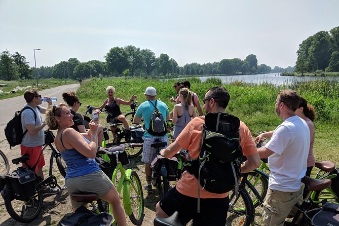 Countryside Bike Tour from Amsterdam: Cheese, Clogs & a Windmill - The IJ River ferry and the windmill stop: the best early contrast