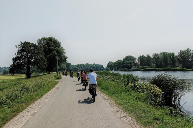 Countryside Bike Tour from Amsterdam: Cheese, Clogs & a Windmill - Monnickendam and Zuiderwoude: harbor town charm, then quiet village lanes