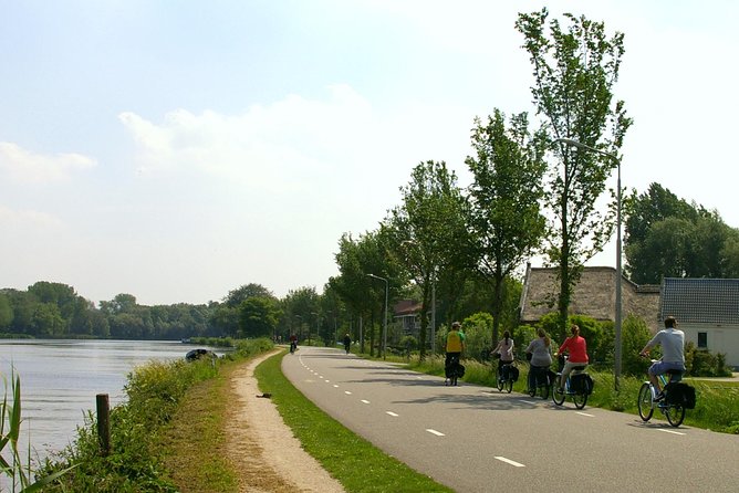Countryside Bike Tour from Amsterdam: Cheese, Clogs & a Windmill - Returning to Amsterdam: the finish feels lighter than you expect