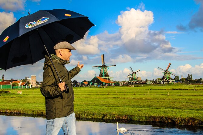 Day Trip to Zaanse Schans, Edam, Volendam and Marken from Amsterdam - Marken and the weather swap: wooden houses, quiet lanes, and a possible replacement