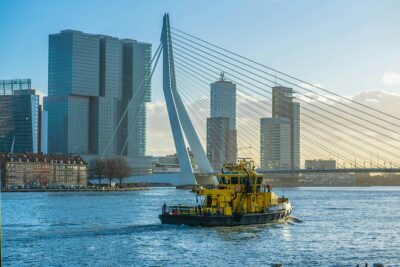 Daytrip Tour from Amsterdam to Rotterdam to The Hague and Delft - Getting on board: meeting point, timing, and how the day runs