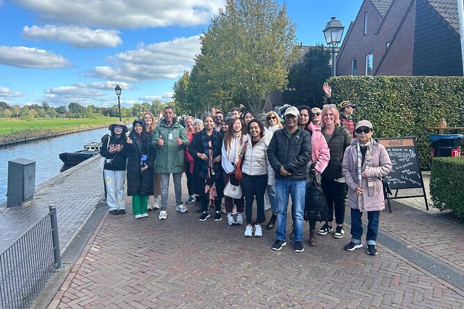 Daytrip Tour from Amsterdam to Zaanse Schans and Giethoorn - Giethoorn: car-free canals, bridges, and a boat cruise that resets your day