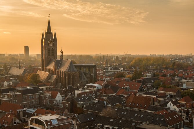 Delft: City Walk with Audio Guide in 7 Languages on your Phone - The Oude Kerk Lean and Delft’s Quirky Details That Stick