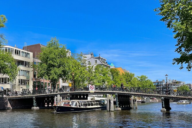 Discover Amsterdam: Luxury Canal Cruise with a Local Skipper - Getting to the boat: Badhuiskade 3 and the free IJ ferry trick