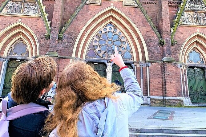Discover Haarlem with a self-guided Outside Escape city game tour - Bakenessergracht canal and Bakenesserkerk’s white tower