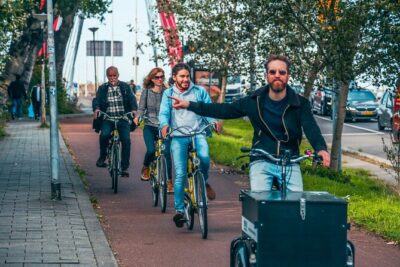 Discover Rotterdam: Classic Highlights Bike Tour with a Local - Stop 1: Hotel New York and the View Toward the Fenix Museum of Migration