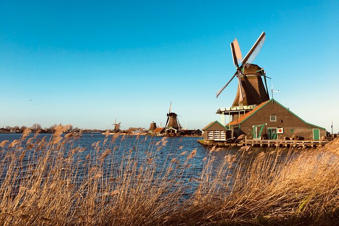 Dreamy Dutch Villages Tour: Giethoorn, Zaanse Schans & More - Picking up in central Amsterdam, then getting out of town fast