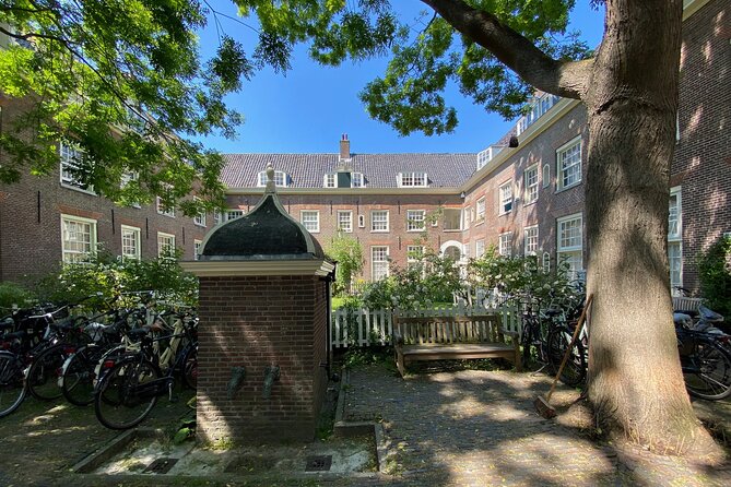 Explore hidden streets with friends - Dam Square, the town hall building, and why the center still matters