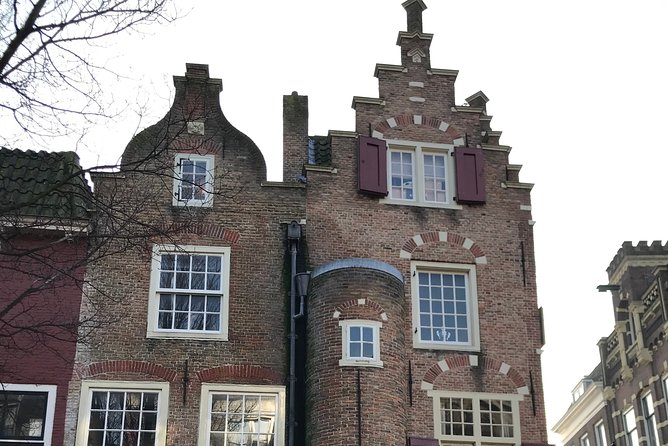 Famous Holland Tour: visit The Hague, Delft, Rotterdam and Kinderdijk from A'dam - Delft without the big-city crush: canals, gables, and that calm factor