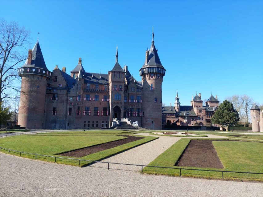 From Amsterdam: Castle De Haar Guided Tour - Entering Kasteel de Haar: guided castle rooms with real story support
