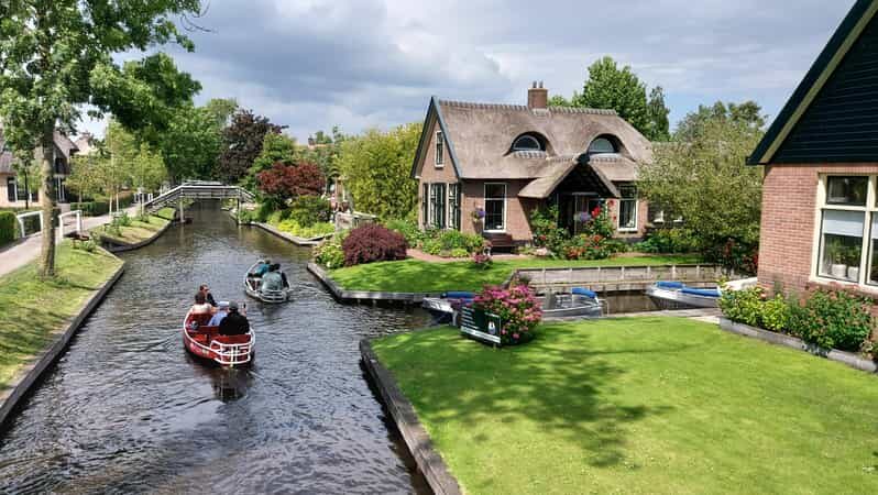From Amsterdam: Giethoorn Small Group Tour with Boat Ride - Meet at Amsterdam Central, Then Roll Out in a Comfort-First Van