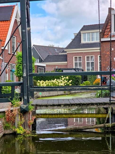 From Amsterdam: Keukenhof Tulips, Windmills & Volendam - Clogs, cheese, and cookie tasting at the working-farm stops