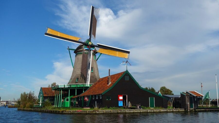 From Amsterdam: Windmills, Volendam, & Marken Private Tour - Volendam Harbor Time: Fishing Village Charm with Real-Life Heat