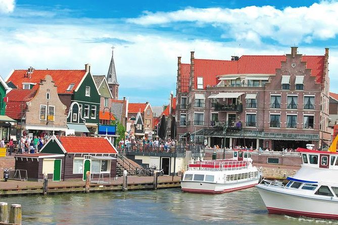From Amsterdam: Zaanse Schans, Volendam, Giethoorn with Boat Tour - Zaanse Schans: Windmills, Clogs, and Cheese Factory Stops