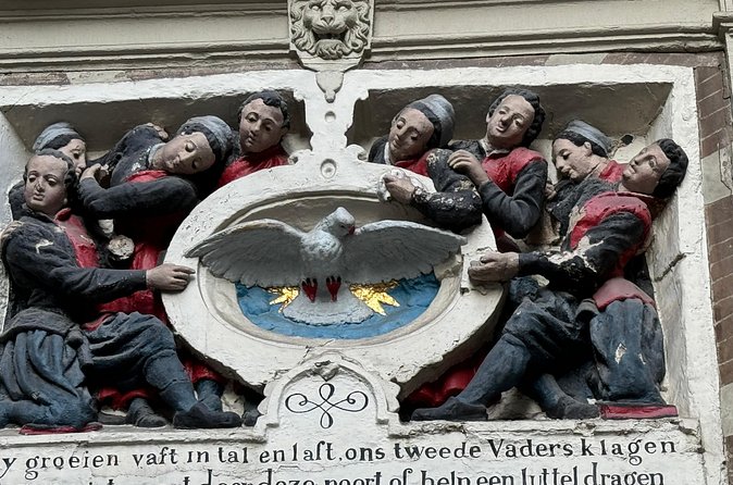 Ghost Walking Tour and Dark History in Amsterdam - Dam Square: witch trials, the 1945 shooting, and haunting rumors