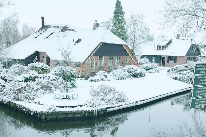 Giethoorn Day Tour from Amsterdam with Small Boat Ride - Walking the waterway village after the cruise