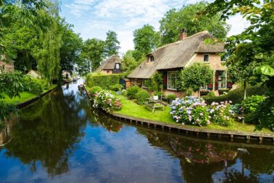 Giethoorn Day Trip from Amsterdam – Private Tour & Canal Boat - Getting to Giethoorn: Private Pickup, Comfort, and Timing
