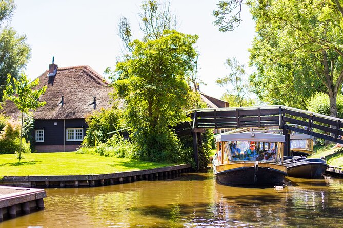 Giethoorn Day Trip from Amsterdam with Boat Trip - From Amsterdam to Giethoorn: The Coach Ride That Sets the Mood