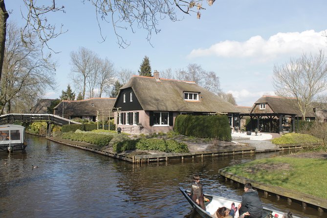 Giethoorn, Zaandam & Zaanse Schans Day Tour w/ Small Boat Ride - Zaanse Schans windmills: your first big photo moment and quick context
