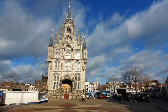 Gouda Cheese and Delft Blue: Full-Day Private Tour - Gouda station streets and the canal approach to Delft