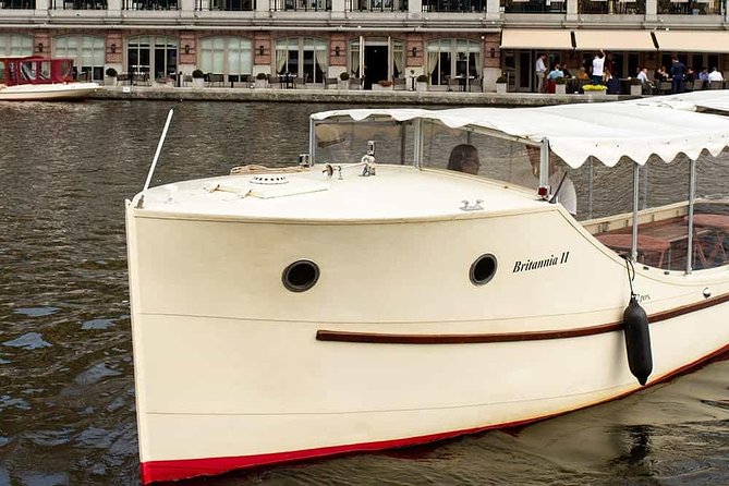 Guided Amsterdam Canal Cruise – Snacks & Drinks on board(1 Hour) - The iconic postcard stretch: arch bridges, love legends, crooked houses