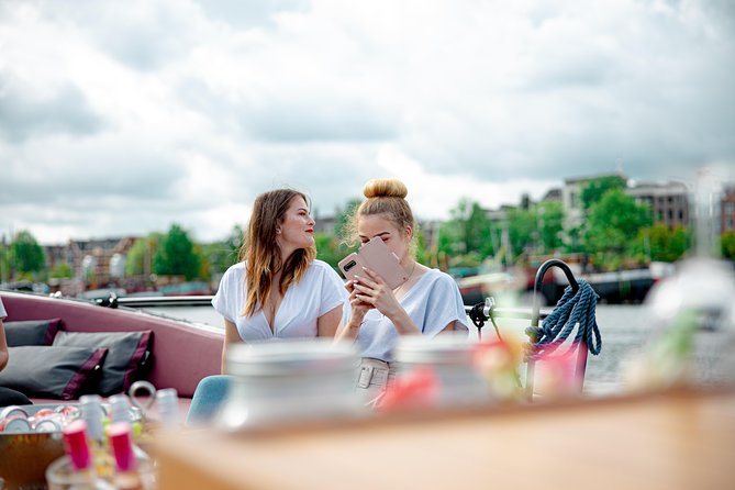 Guided Amsterdam Canal Cruise – Snacks & Drinks on board(1 Hour) - Guides you’ll actually pay attention to: humor plus local detail
