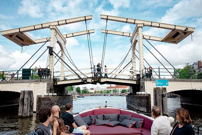 Guided Amsterdam Canal Cruise – Snacks & Drinks on board(1 Hour) - Who this canal cruise suits best (and who should skip it)