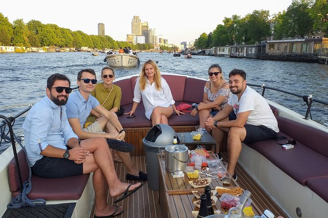 Guided Amsterdam Canal Cruise – Snacks & Drinks on board(1 Hour) - Stop-by-stop route: what each section is really showing you