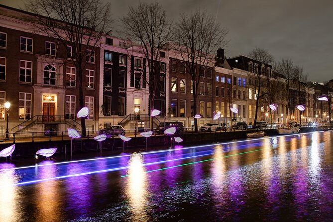 Light Festival Boat Tour max. 10 Guests incl. Gluwhein/Snacks - A Beautiful River Through Amsterdam: What Changes as You Move