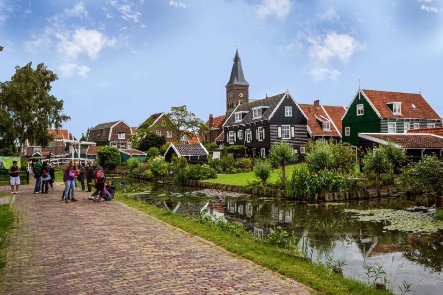 Marken, Volendam and Edam: Private Full-Day Tour - Edam’s historic stops: floating cellar, town hall, and oldest wooden house
