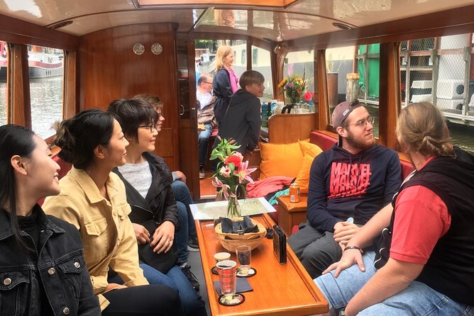 Morning Canal Cruise Amsterdam in Small-Group - What you will actually see: bridges, canal houses, and quiet reflections