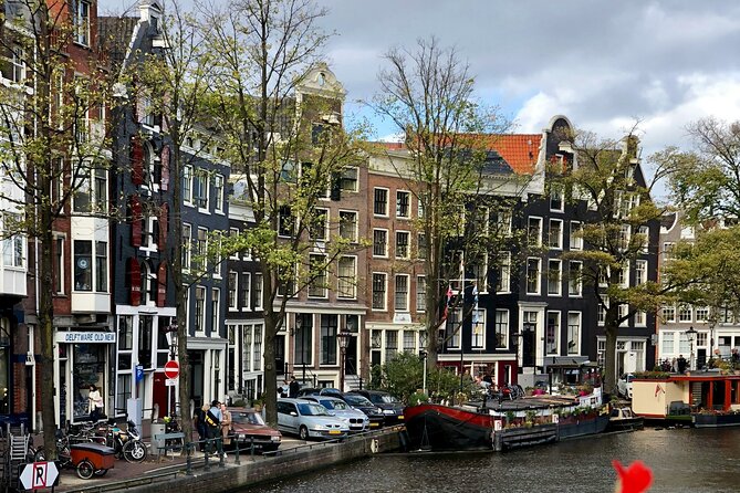 Personalized Hidden Gems of Amsterdam Private Tour with a Local - St. Nicholas Basilica area, dancing houses, and the church dome option