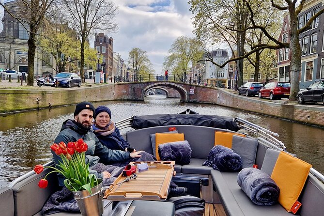 Private 90 Minute Amsterdam Canal Belt Exploration Cruise - Zuiderkerk, Munt Tower, and the Flower Market Float-Past