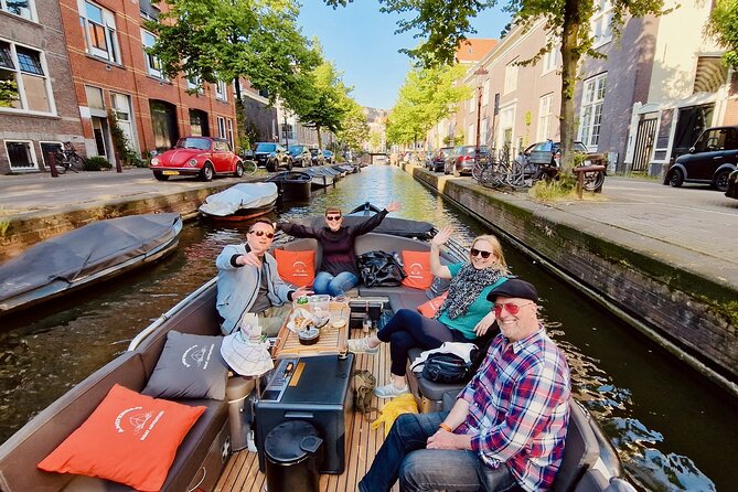 Private 90 Minute Amsterdam Canal Belt Exploration Cruise - Seven Bridges Canal: Reguliersgracht From Under the Arches