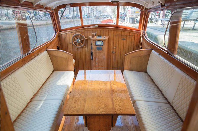 Private Champagne Canal Cruise in Amsterdam - Amstel River sights, locks, and the Amstel Hotel moment