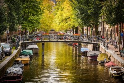 Private departure transfer from Amsterdam to Schiphol Airport (AMS) - In the Car: Mobile WiFi, Water, and a Comfortable Ride