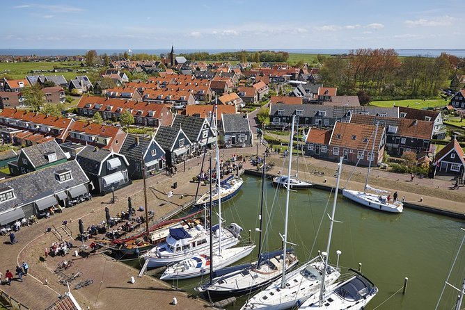Private Excursion to Zaanse Schans, Edam, Volendam and Marken - Volendam harbor time: shops, cafes, and lunch planning that actually helps