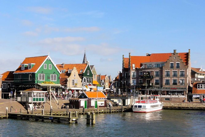 Private Tour Zaanse Schans Windmills and Volendam in Jaguar - Pickup in Amsterdam: where your day starts (and why it matters)
