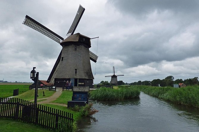 Private Zaanse Schans Windmills and Volendam Tour from Amsterdam - Wooden shoe factory time: clogs made today, not just explained