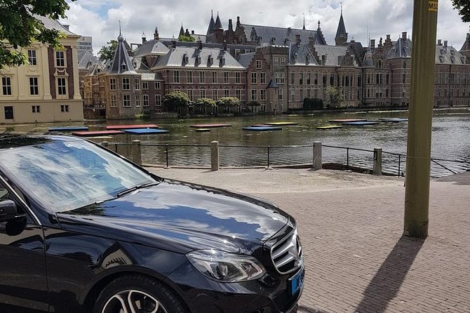 privatetour Delft, The Hague&Rotterdam Kinderdijk from Amsterdam - Koninginnenhoofd and Hotel New York: maritime vibes with river views